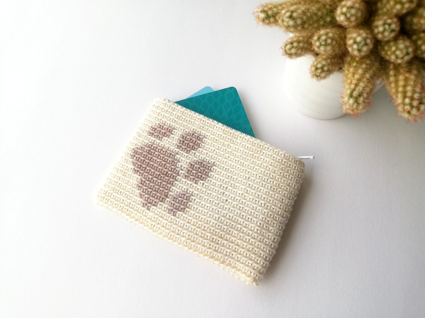Crochet zipper pouch with a paw print