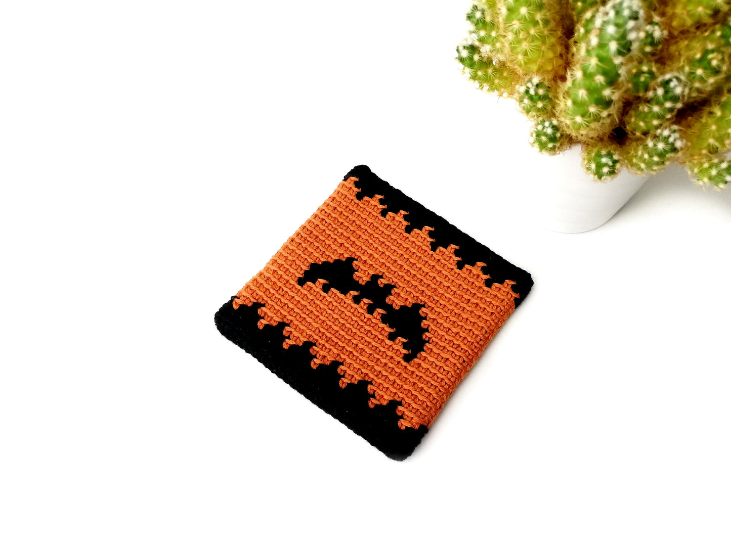 Spooky Halloween coaster with a bat