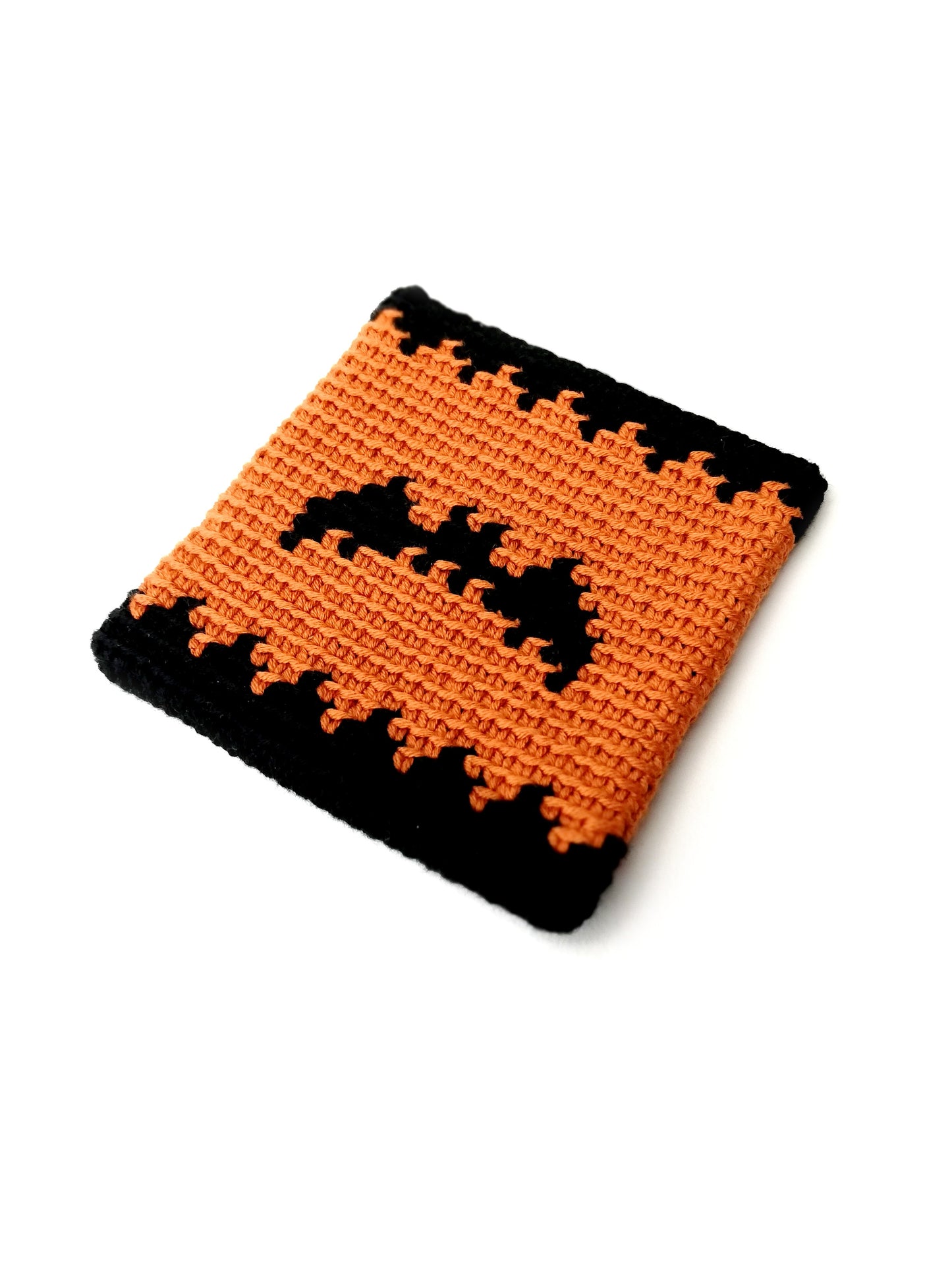 Spooky Halloween coaster with a bat