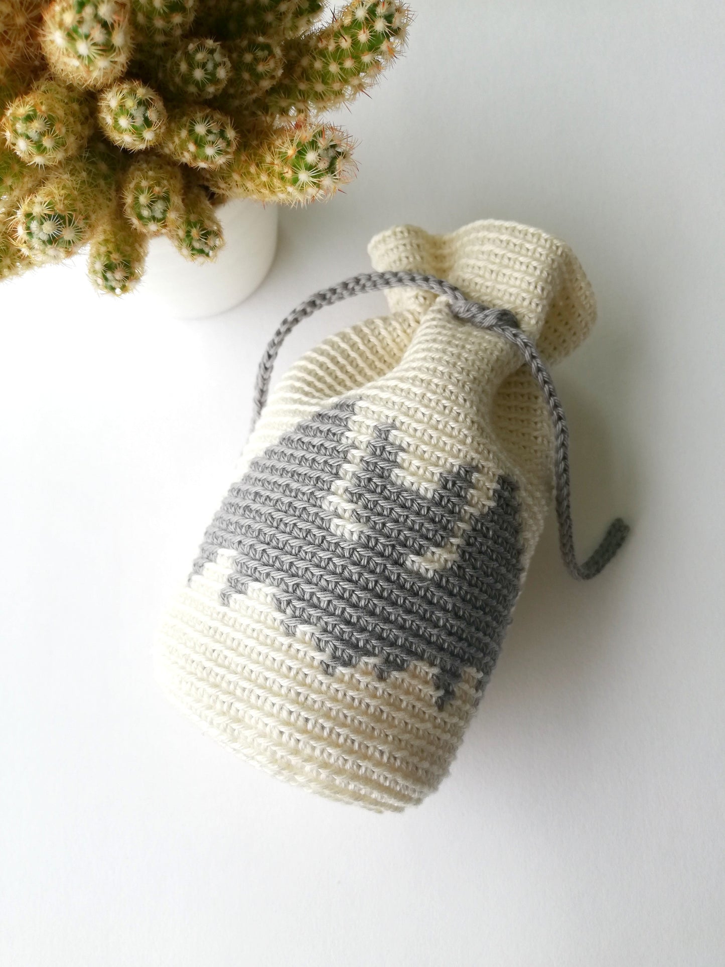 Drawstring bag with a bat