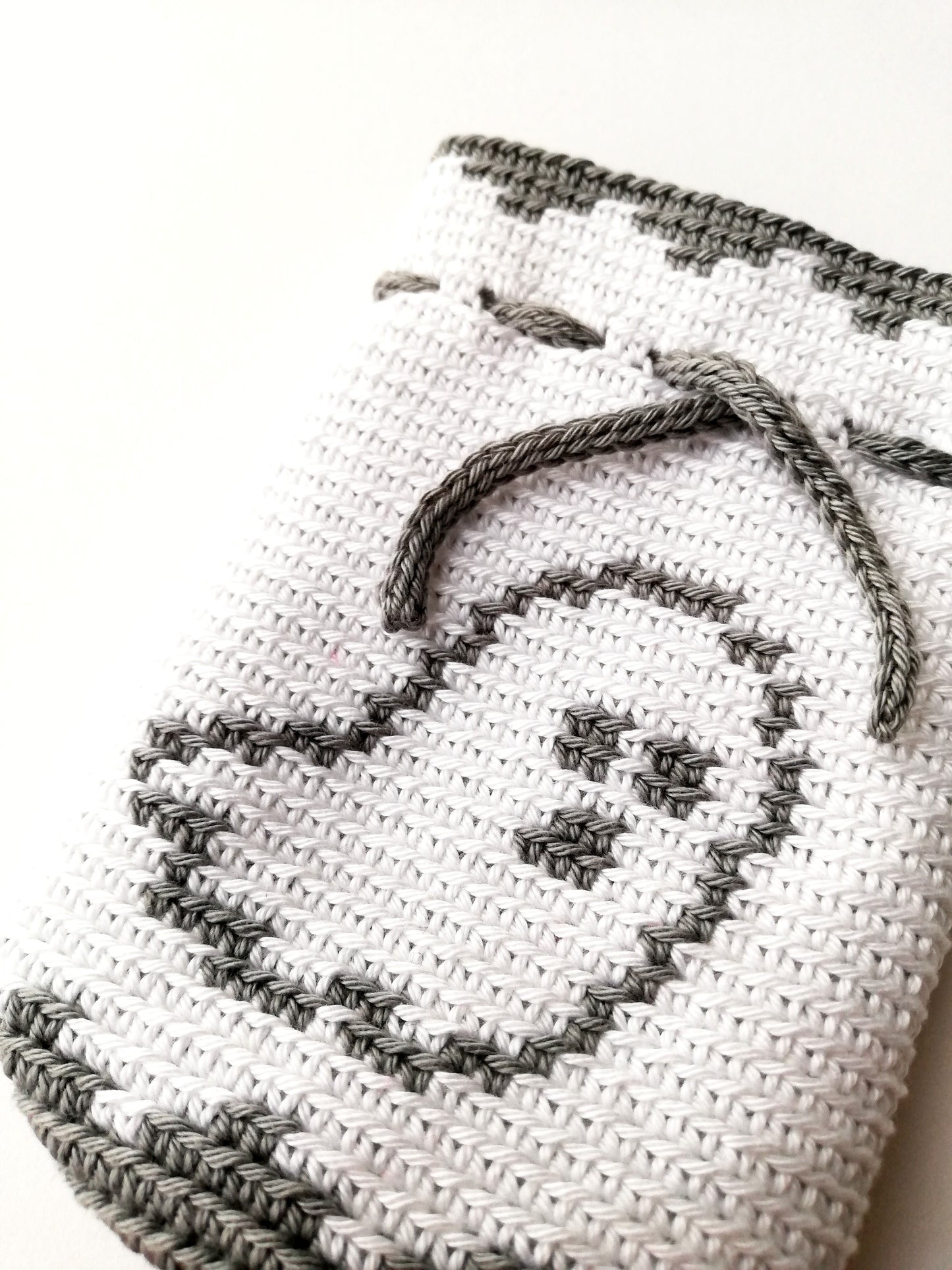 Crochet drawstring bag with a ghost